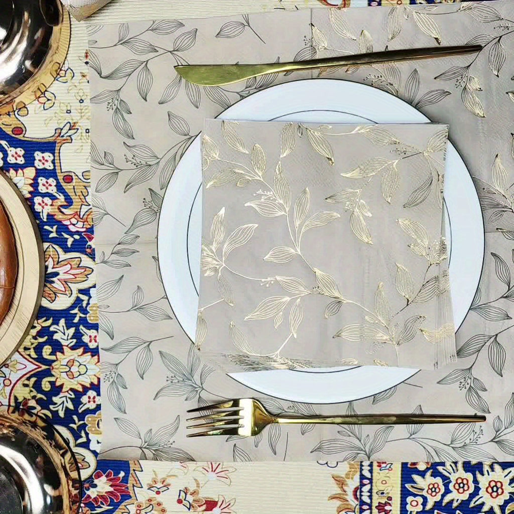 Pack of 60 elegant gold disposable napkins, square paper 33x33 cm, perfect for family meals, weddings, parties and restaurants, refined design.