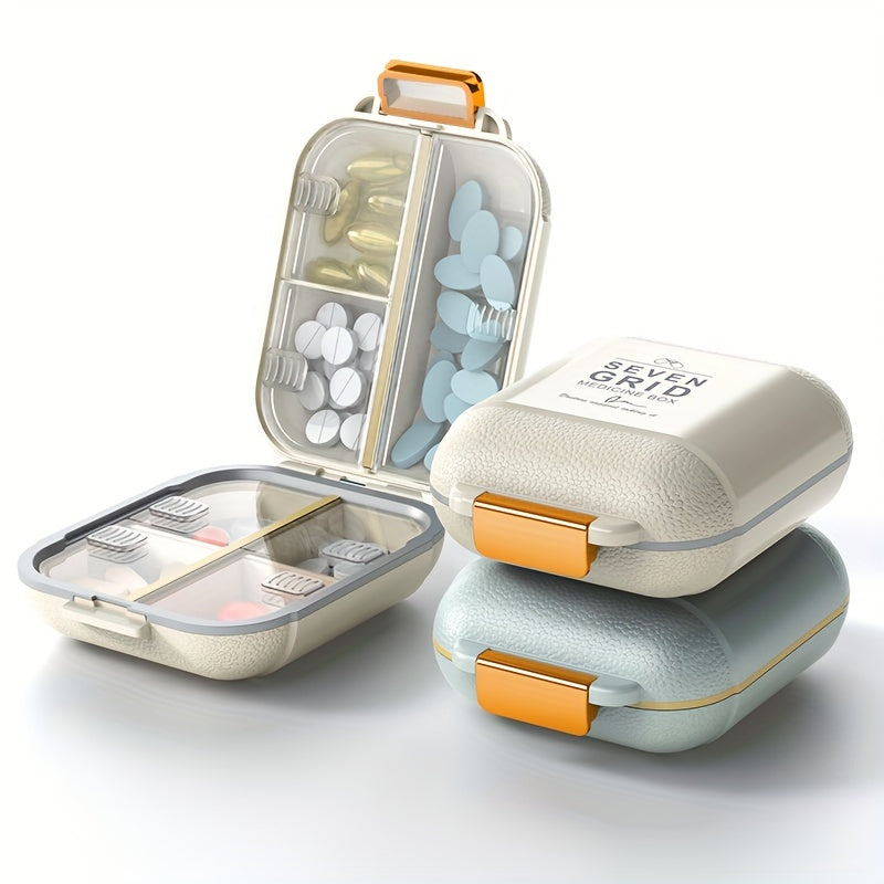 7-day pillbox with orange handles, large capacity, dust and moisture resistant, ideal for vitamins and medications while traveling.