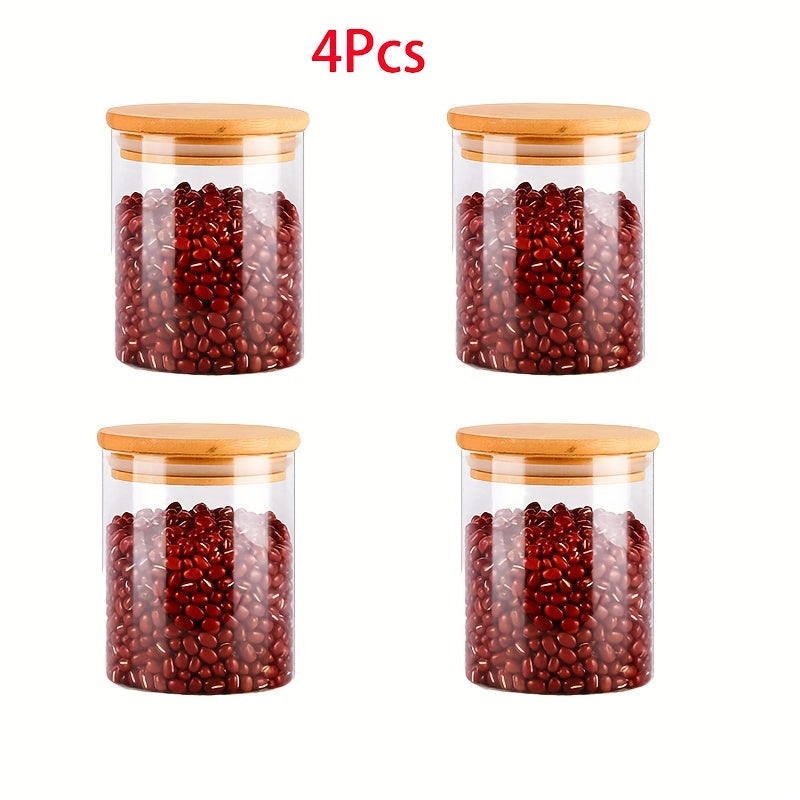 Lot de 4 bocaux de rangement Verre borosilicaté transparent, couvercles bois scellés, idéal pour thé, café, sucre, bonbons, épices, cuisine et organisation maison.