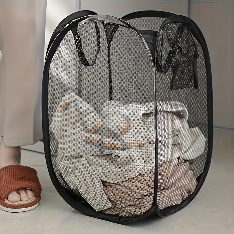 Large capacity collapsible mesh laundry basket with ergonomic handles, ideal for bedroom, bathroom or living room, available in black or red.