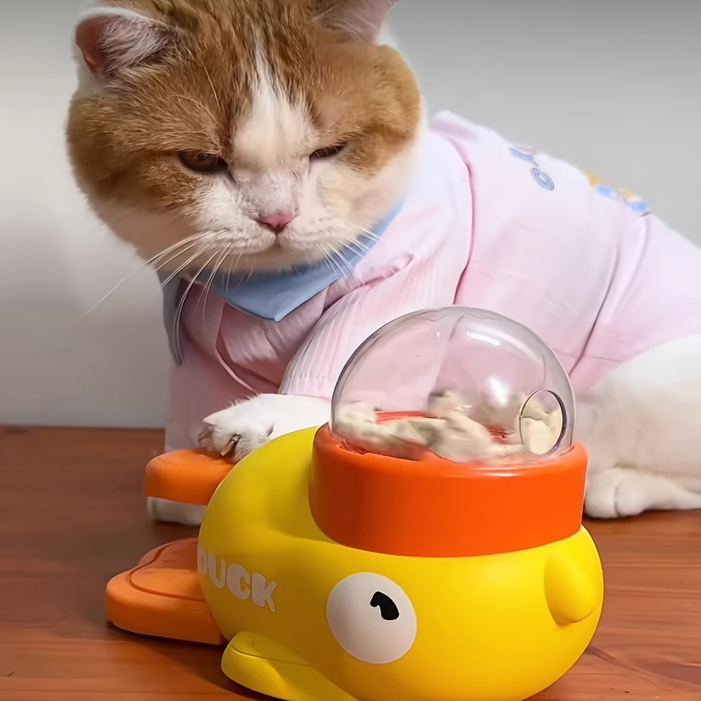 Jouet distributeur de nourriture interactif pour chats. Design canard, sans batterie, en plastique durable, idéal pour jeu et entraînement intérieur/extérieur.