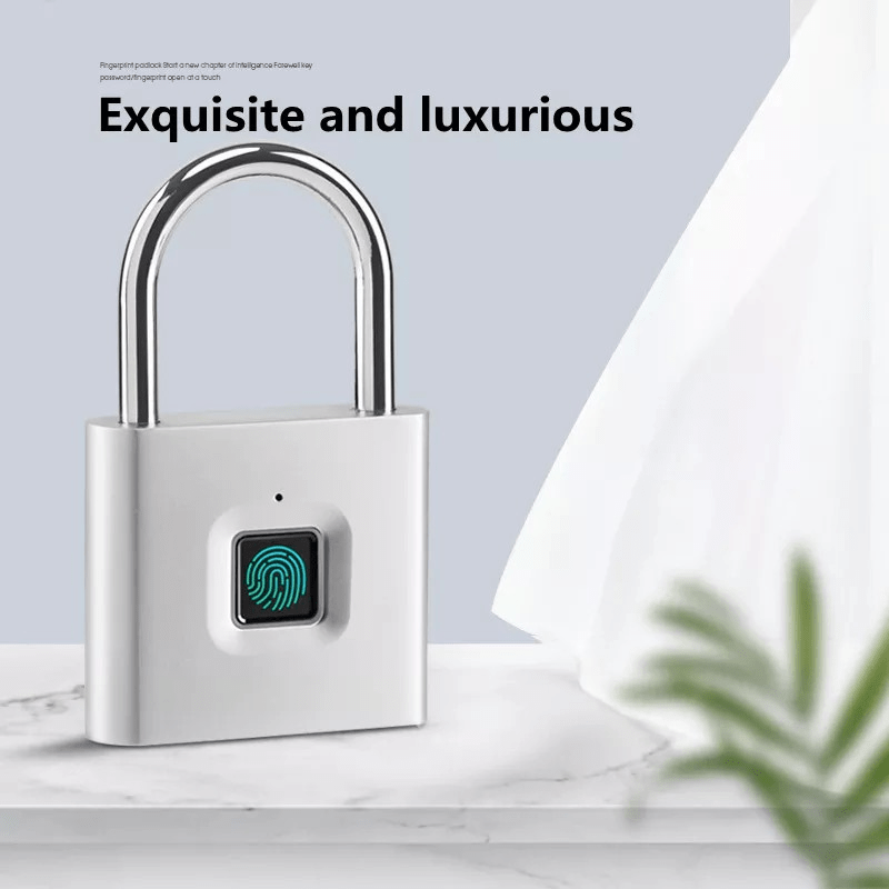 Compact smart fingerprint padlock, waterproof, keyless, USB rechargeable, lightweight aluminum, ideal for suitcases and backpacks.