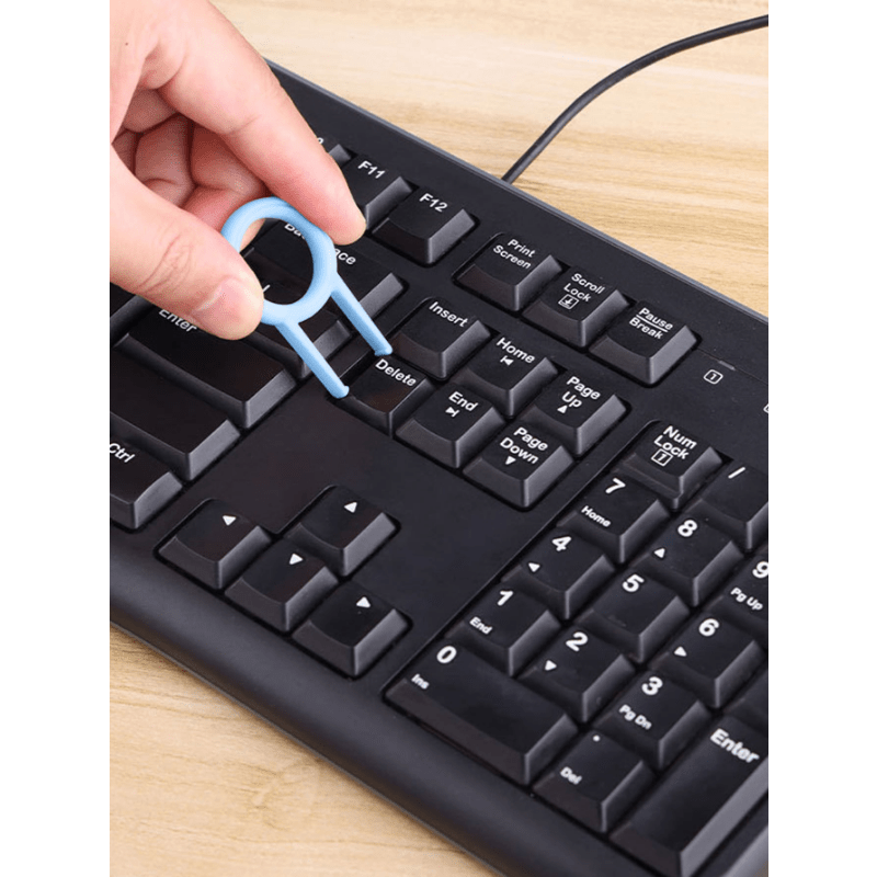 Kit de nettoyage 7-en-1 pour clavier et appareils électroniques, pinceau à poils doux, extracteur de touches, portable, poignée ergonomique, pour ordinateurs, casques et téléphones.