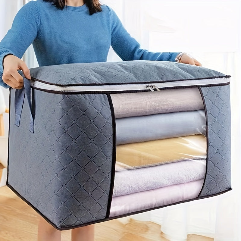 Boîte de rangement matelassée grande capacité avec fermeture éclair, bleue, portable, compartiments multiples, idéale pour serviettes, linge et vêtements, fenêtre transparente et poignées.