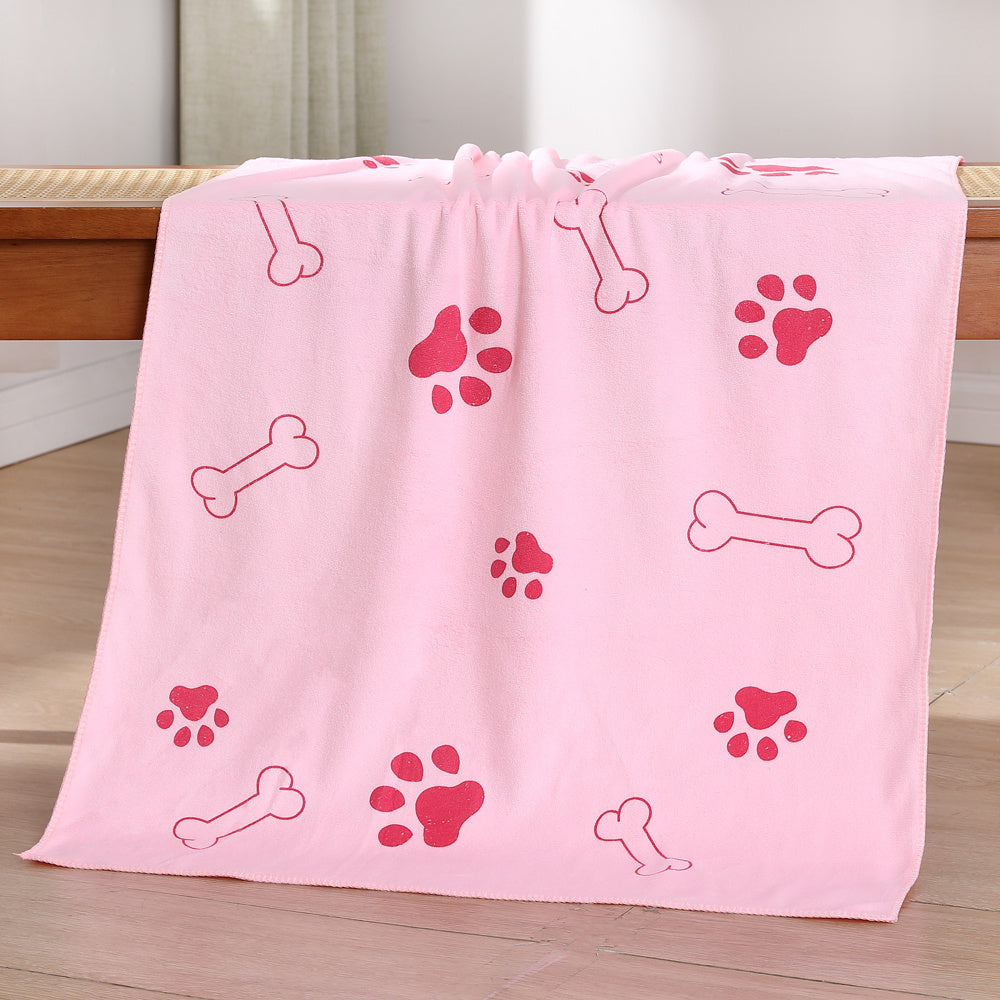 Serviette en microfibre pour chiens, ultra-absorbante, séchage rapide, motif os et patte, lavable en machine, adaptée toutes tailles et races.