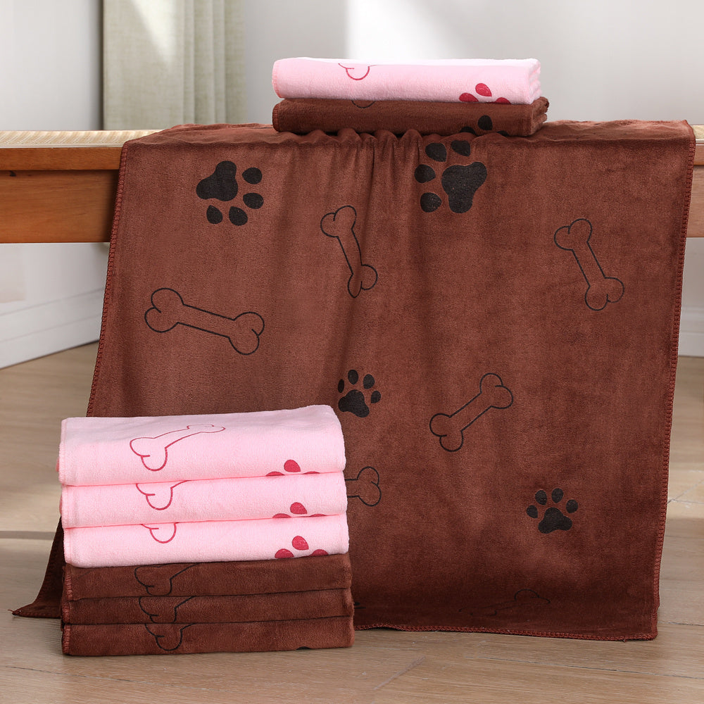 Serviette en microfibre pour chiens, ultra-absorbante, séchage rapide, motif os et patte, lavable en machine, adaptée toutes tailles et races.