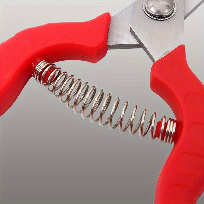 Sécateur professionnel à poignées ergonomiques rouges, lames inox tranchantes assurant des coupes précises pour massifs, aménagement paysager et entretien extérieur.