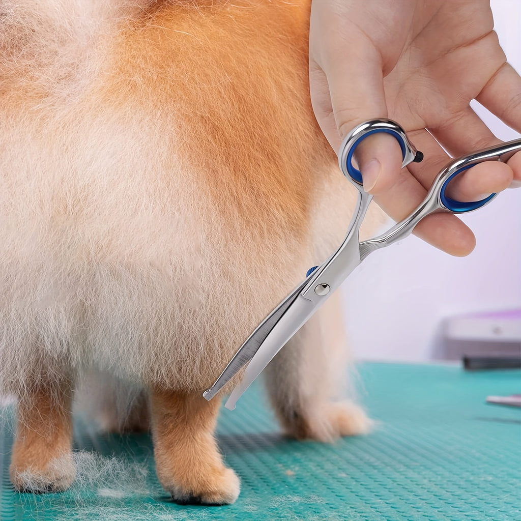 Pet grooming scissors set with safe, rounded tips. Curved stainless steel scissors, perfect for dogs and cats.