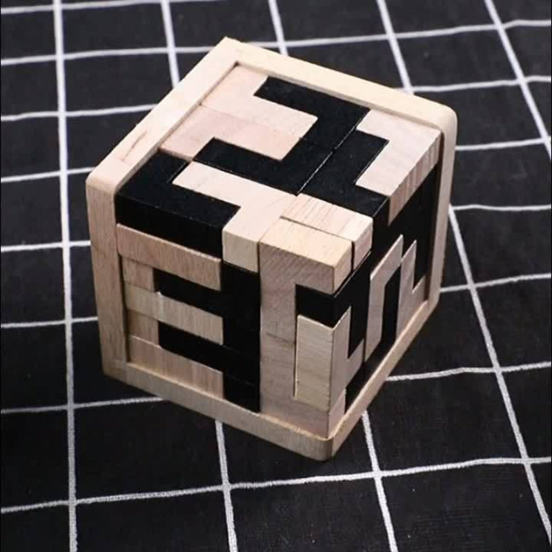 Set of 54 3D Brain Teaser wooden cube games. Perfect gift for brain training, Christmas, birthdays, and Halloween decorations.