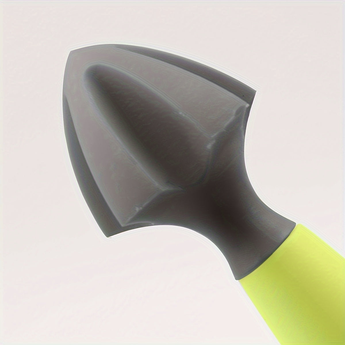 Zesteur et presse-citron multifonction vert, lame inox, râpe intégrée, ergonomique et durable, idéal pour jus et râpage d’agrumes en cuisine.