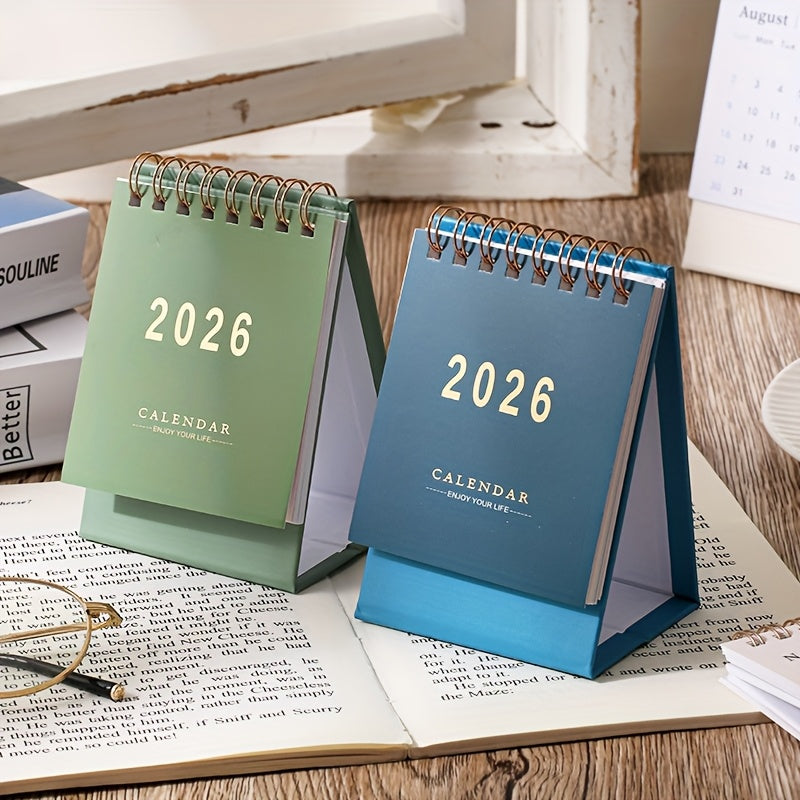 Mini desk calendar 2026, monthly and weekly planner, thick 250 g/m² paper, double spiral binding, compact and elegant for home or office.