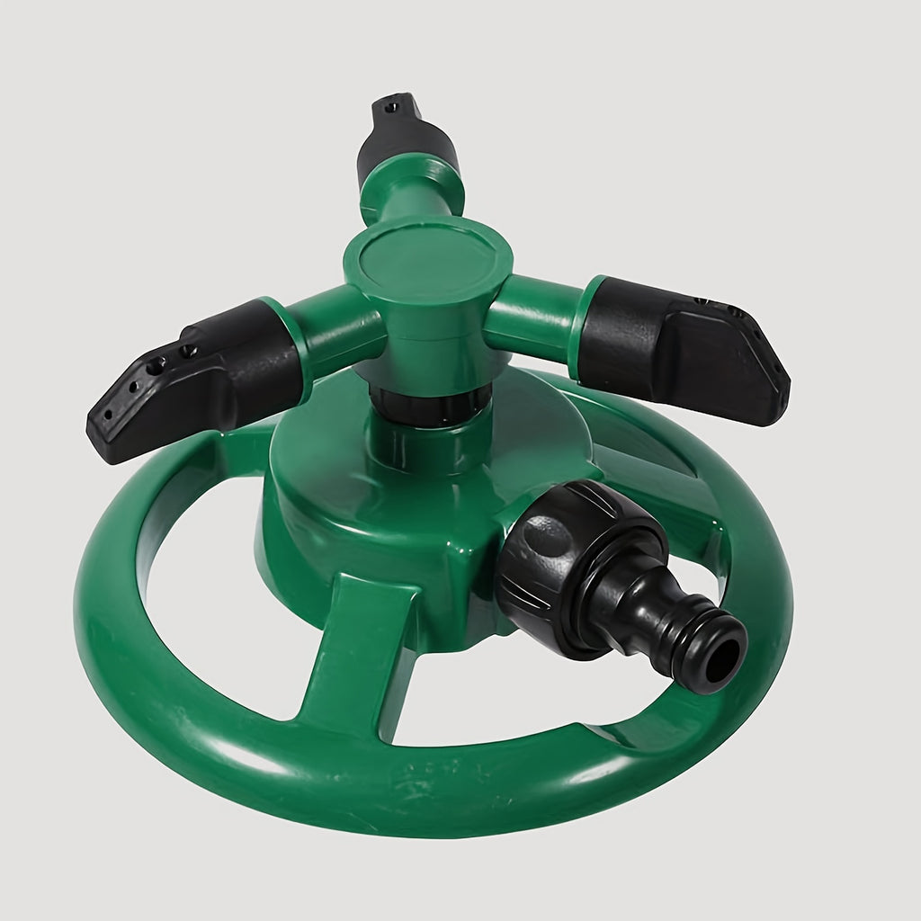 360° rotating sprinkler head, efficient garden irrigation, adjustable flow rate, complete lawn and plant coverage, green plastic design.