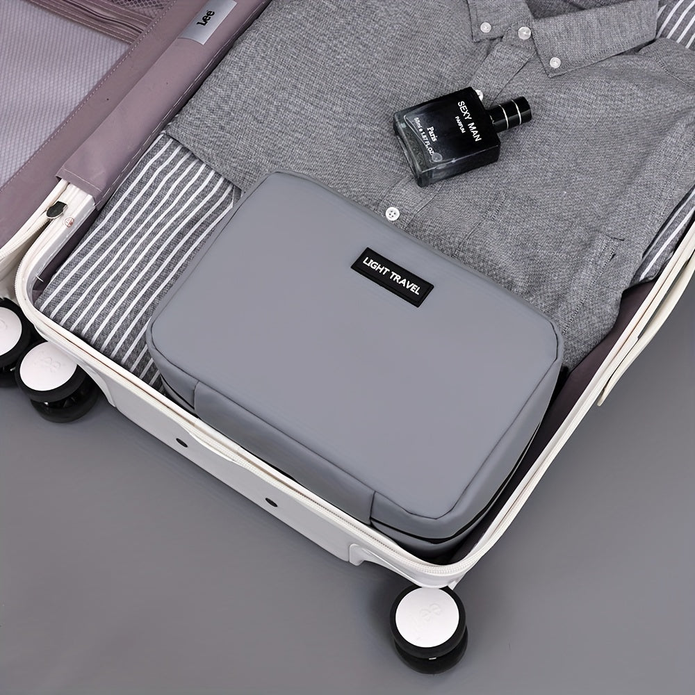 Lightweight and waterproof toiletry bag, polyester, zipped, portable and machine washable, ideal for travel, black color.