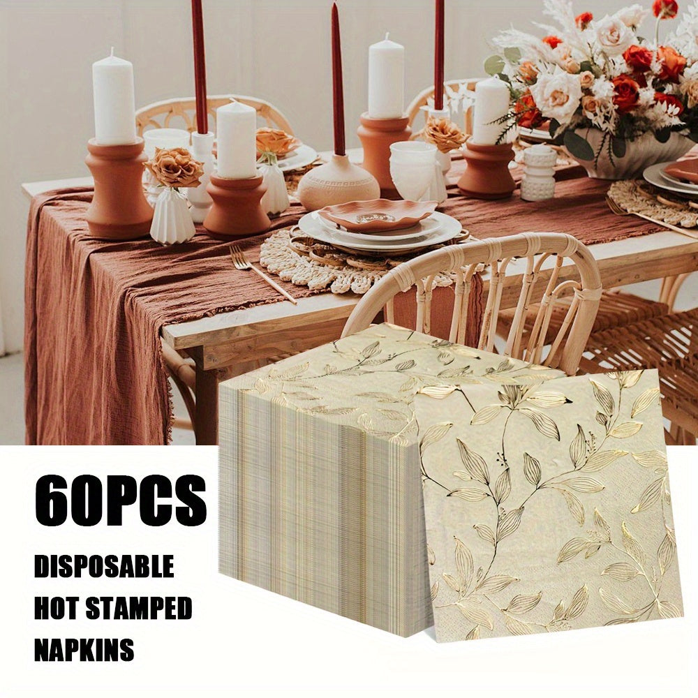 Pack of 60 elegant gold disposable napkins, square paper 33x33 cm, perfect for family meals, weddings, parties and restaurants, refined design.
