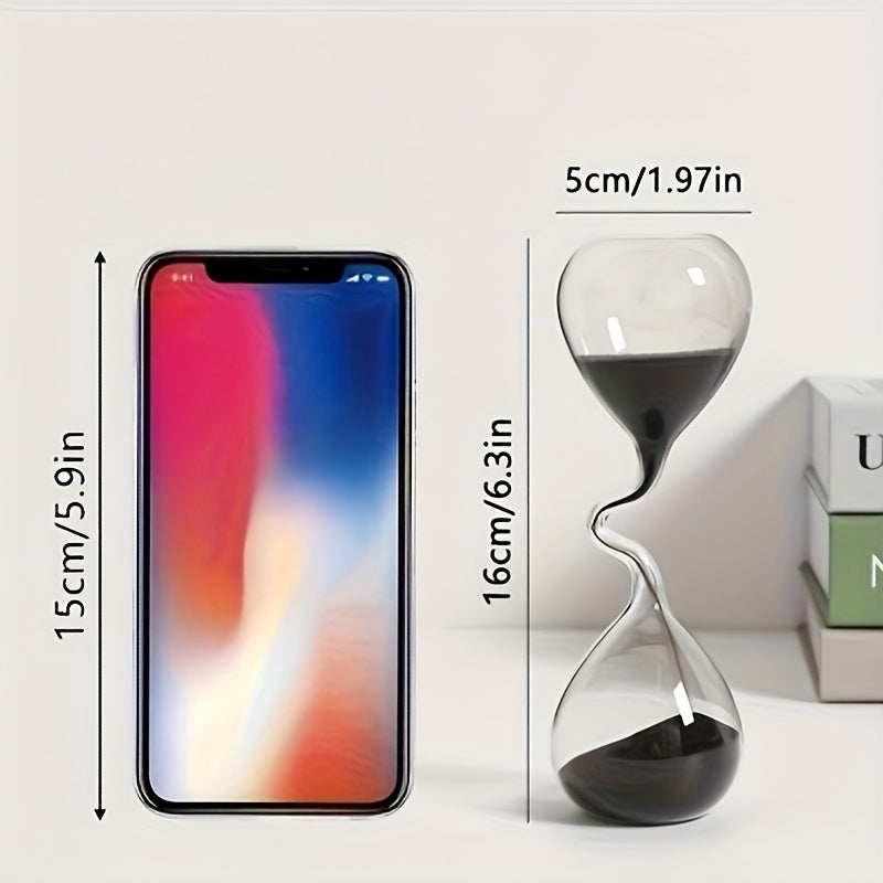 Horloge de sable noire au design courbé, décor moderne. Accessoire décoratif pour salon, chambre, bureau et extérieur, sans électricité.