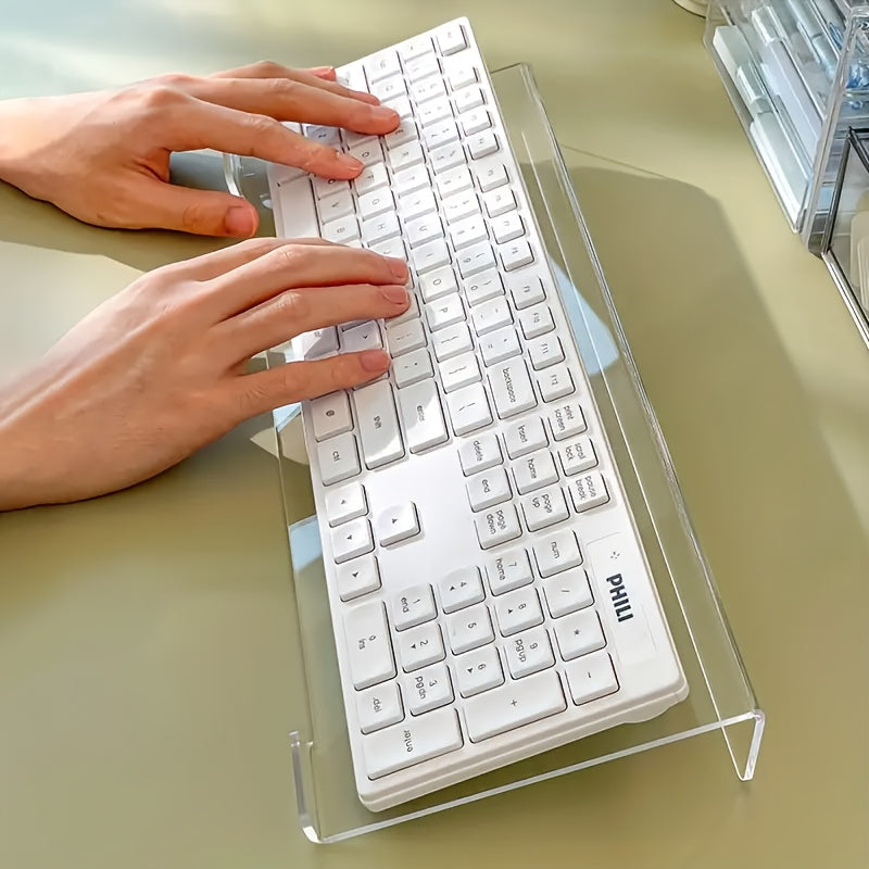 Acrylic keyboard stand, compact and durable, raises keyboard and mini PC, modern design and space saving, ideal for contemporary offices.