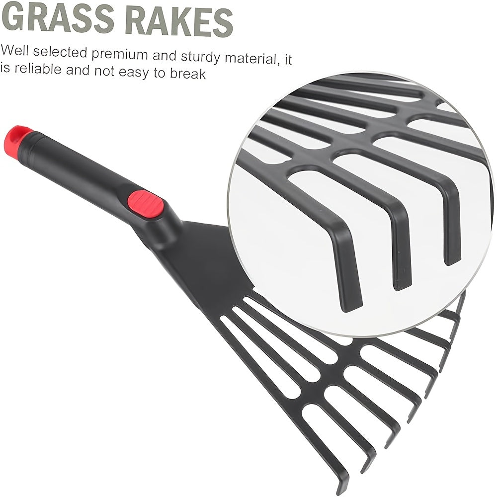 Black plastic garden rake with handle, sturdy and portable, ideal for leaves, lawn and outdoor maintenance.