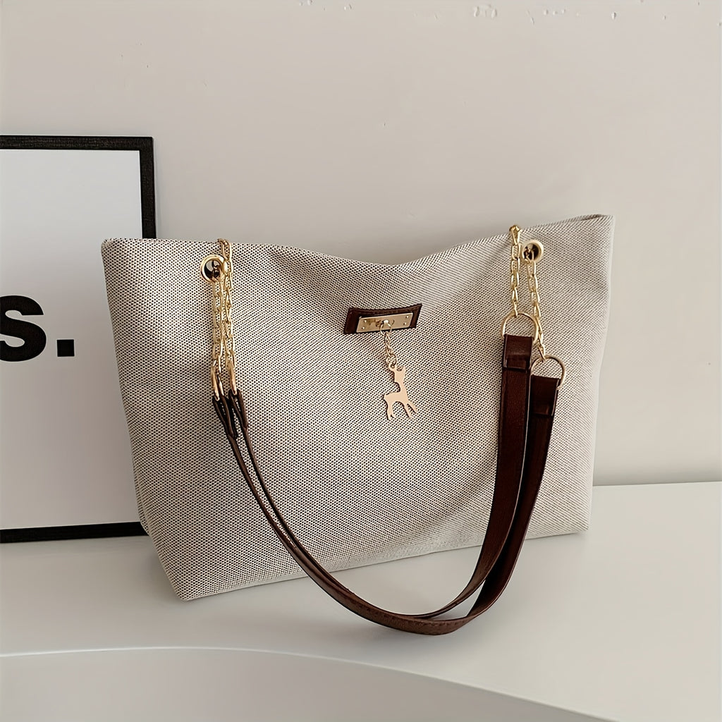 Sac fourre-tout en polyester tendance, grande capacité, bandoulière réglable, fermeture zippée, orné d’un charm cerf, style besace pour femme.