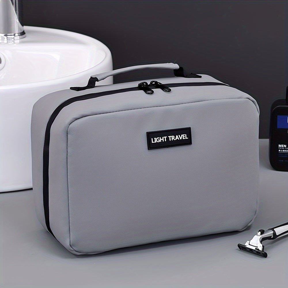 Lightweight and waterproof toiletry bag, polyester, zipped, portable and machine washable, ideal for travel, black color.