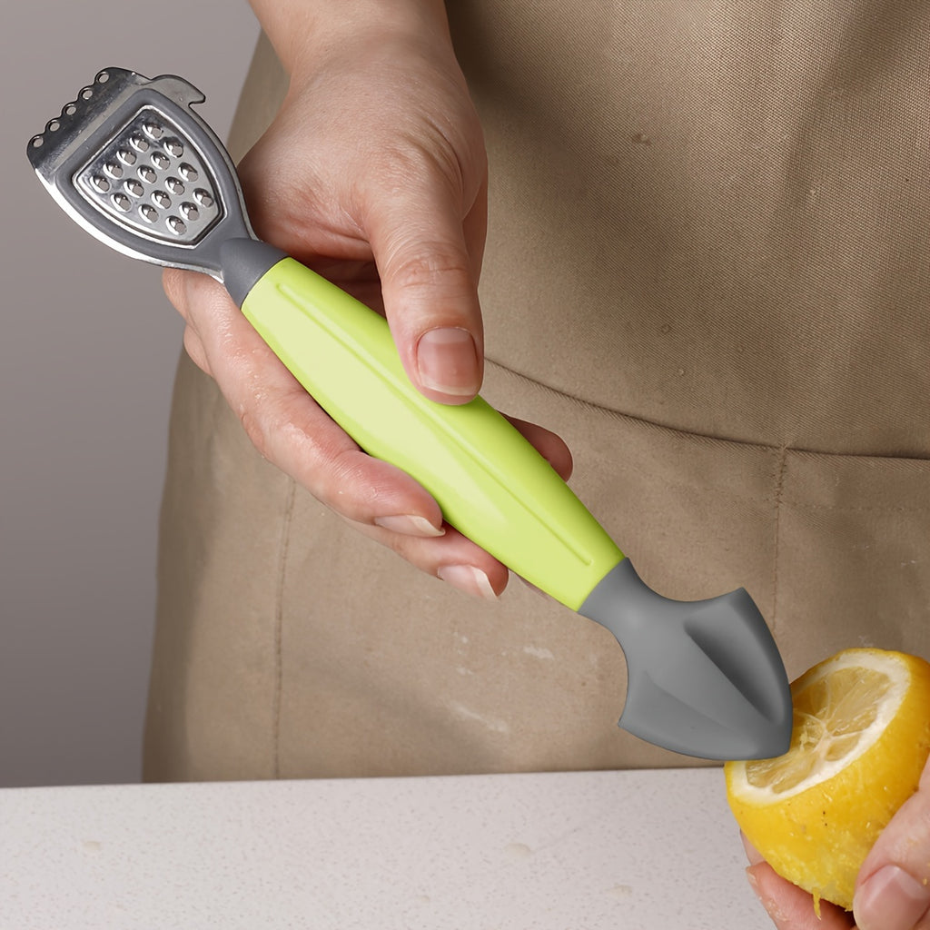 Zesteur et presse-citron multifonction vert, lame inox, râpe intégrée, ergonomique et durable, idéal pour jus et râpage d’agrumes en cuisine.