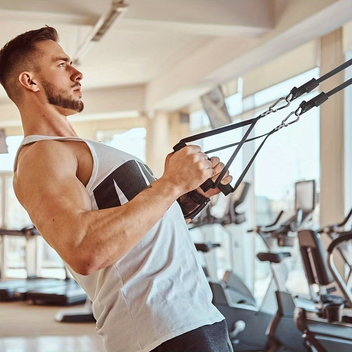 Paires de poignées d’exercice avec mousses haute densité et boucles, offrant confort et résistance pour Pilates, yoga et renforcement musculaire.