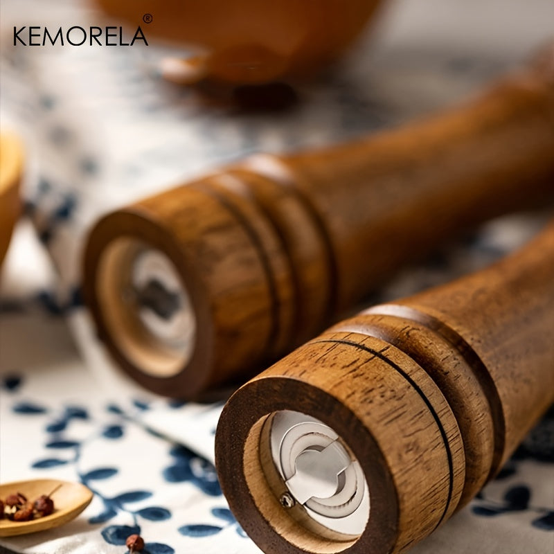 KEMORELA Wooden Manual Pepper Mill: Classic design, durable natural material, precise grinding, ergonomic, quality culinary accessory for kitchen and table.
