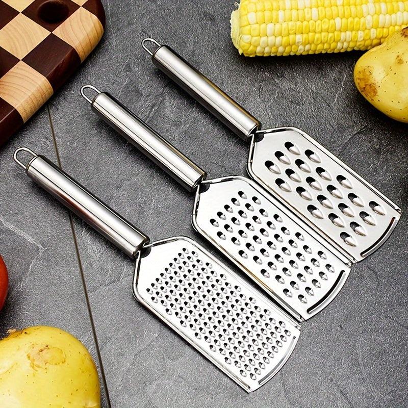Set of 3 stainless steel kitchen utensils: peeler, grater and can opener, versatile for fruits, vegetables and potatoes.