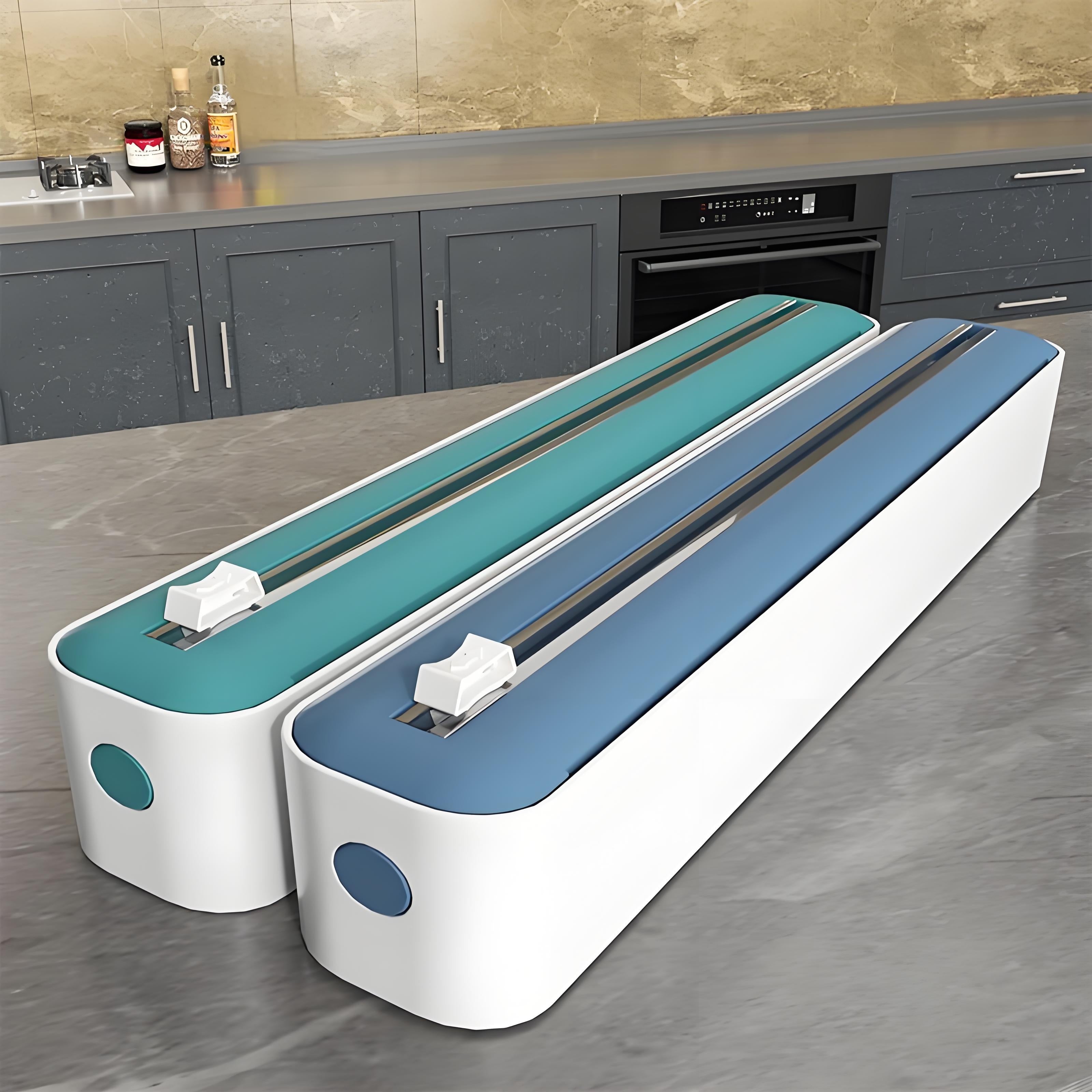 Reusable double-action dispenser and cutter for plastic film, aluminum, baking paper and wax, modern white/black design with orange accents.