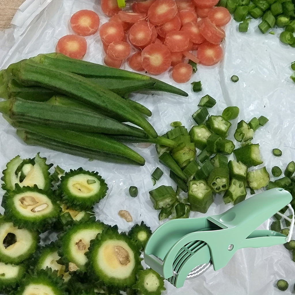 Coupe-légumes et fruits multifonction manuel, design ergonomique vert, lames en acier inoxydable réglables, corps en polypropylène durable, idéal carottes, concombres et tomates.
