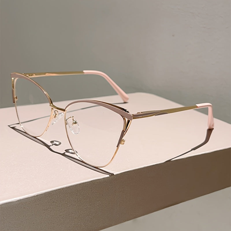 Paire de lunettes style œil de chat pour femmes, monture métallique légère, tendance rétro, couleur rose élégante, sans correction.