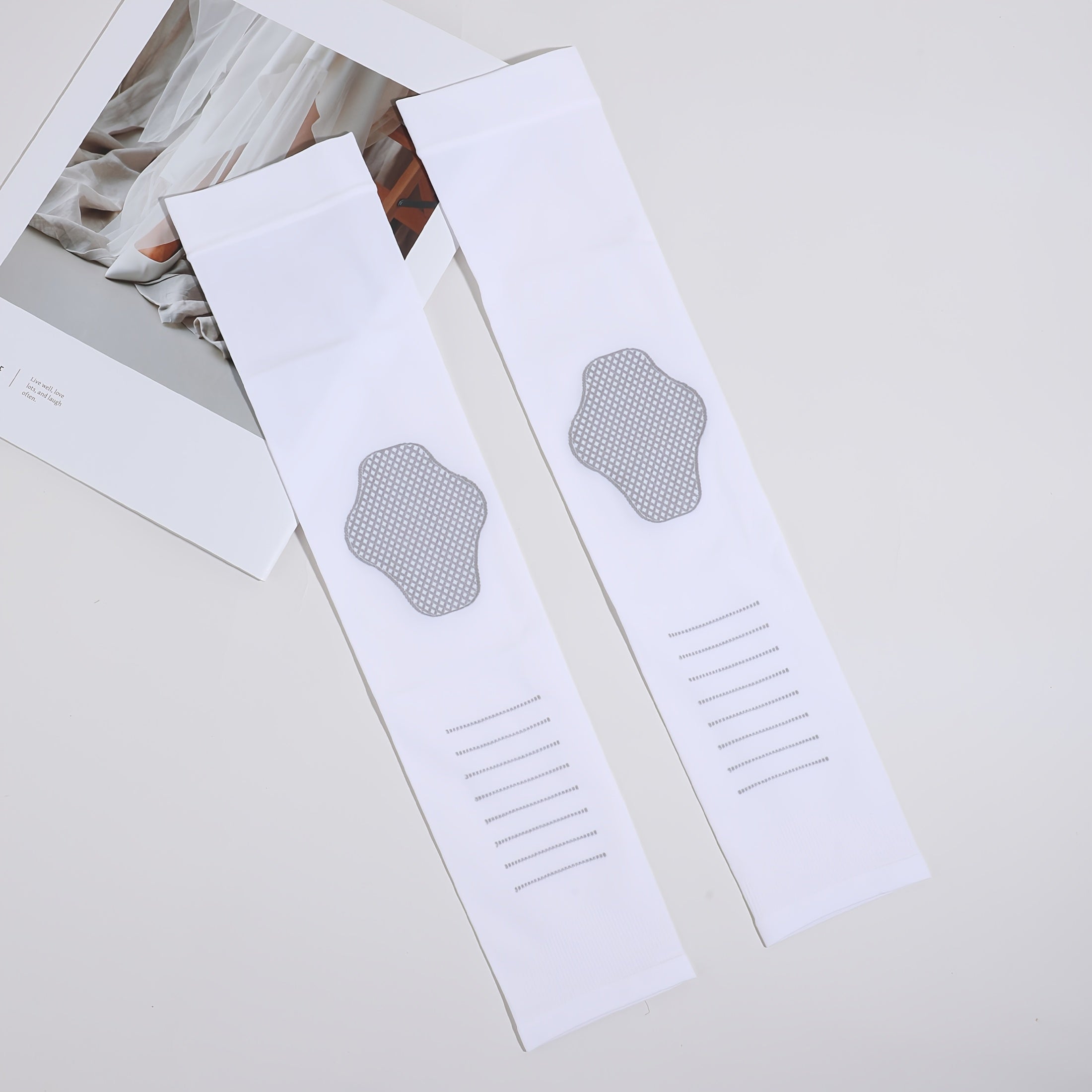 Manchons haute élasticité unis, confortables et respirants, offrant protection et maintien pour activités sportives extérieures et usage quotidien.