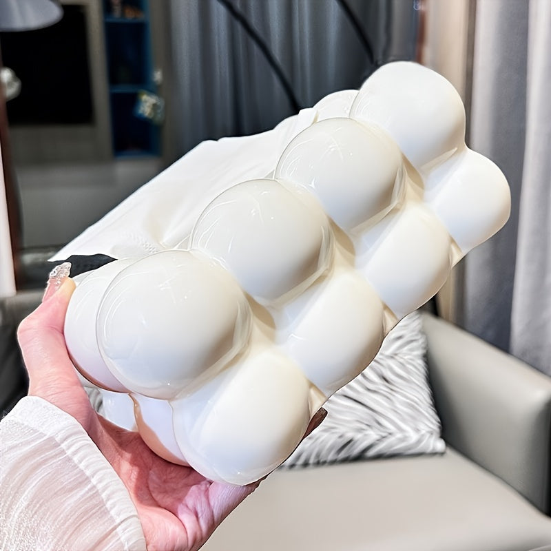 Distributeur de serviettes en forme de nuage. En polypropylène durable, idéal pour la décoration de cuisine et salle à manger.