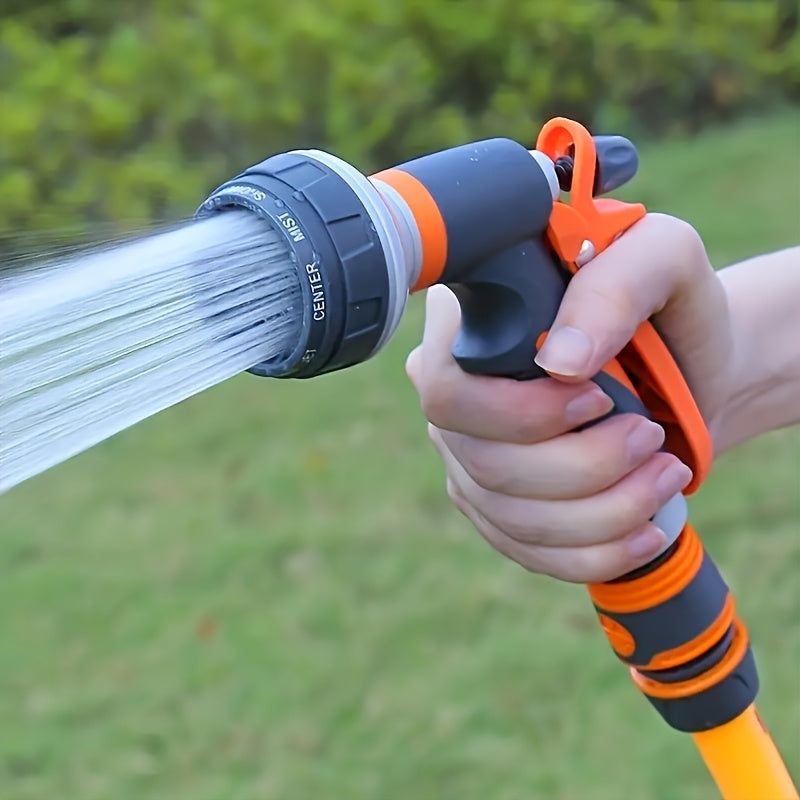 High pressure watering gun, adjustable nozzle, lightweight and durable plastic, ergonomic orange/black handle, ideal for lawns, cars and gardens.