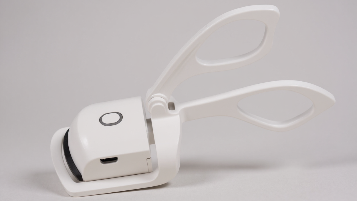 Recourbe-cils électrique 2-en-1, rechargeable USB, chauffe rapide, design moderne, pour des cils parfaitement courbés, idéal maison et voyage.