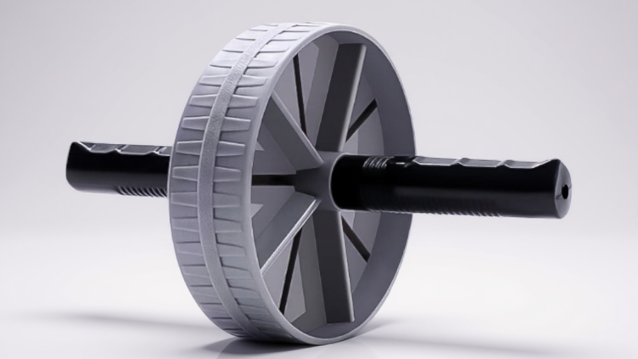 Effective abdominal roller, grey and black design, fitness tool to strengthen the core, train muscles and promote weight loss.